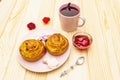 Karkade tea from hibiscus petals Sudanese rose. Gentle romantic breakfast concept. Buns, meringues, strawberry jelly. On a