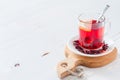 Karkade tea on white wood background Royalty Free Stock Photo