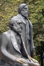 Karl Marx and Friedrich Engels sculpture in the Marx-Engels-Forum, a public park in the central Mitte district of Berlin, Germany Royalty Free Stock Photo