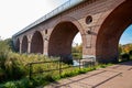 Karlino, Zachodniopomorskie / Poland - October, 15, 2019: Old brick railway bridge over a small river. Brick building in Central