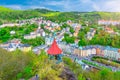 Karlovy Vary Carlsbad historical city centre top aerial view with colorful beautiful buildings, Slavkov Forest Royalty Free Stock Photo