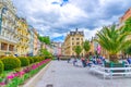 Karlovy Vary, Czech Republic, May 9, 2019: people are walking down street and Tepla river embankment Royalty Free Stock Photo