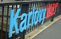 Karlovy Vary sign on bridge across the river tepla