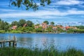 KARLSKRONA, SWEDEN - 2017 July. Typical red Swedish wooden houses with natiaonal flag in the city of Karlskrona Royalty Free Stock Photo