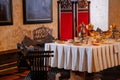 Karlstejn, Czech Republic, 12 March 2022: medieval gothic castle interior, antique wood carved furniture, dining room or grand Royalty Free Stock Photo