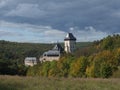 Karlstejn gothic state castle near Prague, the most famous castle in Czech Republic with grass meadow and autumn colored