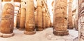 Karnak Temple columns with ancient carvings, Luxor, Egypt Royalty Free Stock Photo