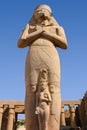 Karnak temple complex in Luxor, Egypt. Statue of pharaoh Ramses II with wife Royalty Free Stock Photo