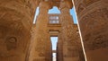 Karnak Temple in Luxor, Egypt. Camera moves between majestic columns with ancient Egyptian drawings. Gimbal high quality