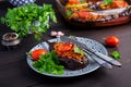 Karniyarik - turkish traditional aubergine eggplant meal. Stuffed eggplants with ground beef