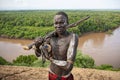 Man from the Caro tribe with an old rifle. Ethiopia, Omo Valley