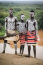 Karo young men on the banks of Omo river