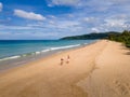 Karon Beach Phuket Thailand, couple man and woman walking on the beach, drone aerial view of the beach Royalty Free Stock Photo