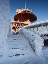 18.12.2022 Karpacz, Poland - Meteorological station on Mount Sniezka at sunrise. Winter in the Giant Mountains