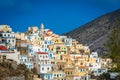 Hillside colorful homes in the old tradition village Olympos