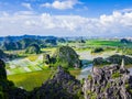 Karst formations and rice paddy fields in Tam Coc, Ninh Binh province, Vietnam Royalty Free Stock Photo