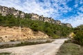 The karstic cliffs in large lagoon of Tobar in Beteta, Cuenca, Castilla la Mancha, Spain