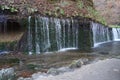 Karuizawa Shiraito waterfalls peaceful natural area featuring a small arc-shaped waterfall framed by mountain slopes