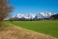 Karwendel mountain range, view from Gerold, with green meadow Royalty Free Stock Photo