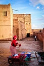 Kasbah Taourirt. woman laundering. Ouarzazate. Morocco.