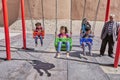 Iranian little children swing on swing, Kashan, Iran.