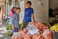 Two boys work in a vegetable shop, Kashan, Iran. Royalty Free Stock Photo