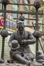 Statue of traditional Uigher hat maker, Kashgar, China