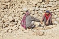 Kashmiri rock carriers taking chat break Royalty Free Stock Photo