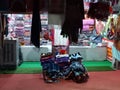 kashmiri shawls and clothing for sale in a local shop outside Bahu Fort in Jammu, India