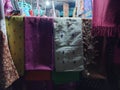 kashmiri shawls and clothing for sale in a local shop outside Bahu Fort in Jammu, India