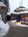 Kashmirs famous hotel in Gulmarag Khyber hotel 24hrs power facility &swimng pool facility in very room shining snow on roofs Royalty Free Stock Photo