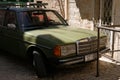 Kastela, Croatia. August 17 2021. Classic Mercedes Benz 1W123 parked in the street of the old town Royalty Free Stock Photo