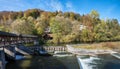 Kastenmuhlwehr Wolfratshausen, Loisach river with weir, autumn landscape