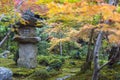 Kasuga doro or stone lantern in Japanese maple garden during autumn at Enkoji temple, Kyoto, Japan Royalty Free Stock Photo
