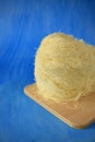 Kataifi dough on blue background