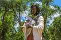 Kateri Tekakwitha - Catholic saint and AlgonquinÃ¢â¬âMohawk laywoman-Bronze statue in front of the old Royalty Free Stock Photo