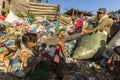 KATHMANDU, NEPAL - child and his parents during lunch in break between working on dump Royalty Free Stock Photo