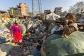 KATHMANDU, NEPAL - child and his parents during lunch in break between working on dump. Royalty Free Stock Photo