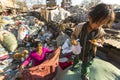 KATHMANDU, NEPAL - child and his parents during lunch in break between working on dump. Royalty Free Stock Photo