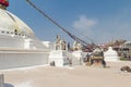 Kathmandu, Nepal - Circa June 2013: Local people praying at Boudhanath Stupa