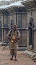 Hindu Monk Sadhu walking around Pashupatinath Temple