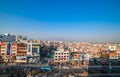 Kathmandu, Nepal - December 29 2019: Vehicles making their way through the main street of the city