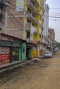 Colorful dirty and dusty street area in Sinamangal, Kathmandu, Nepal