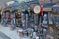 An entrance to the restaurant and souvenir shop with traditional wooden masks and statues, Kathmandu, Nepal Royalty Free Stock Photo