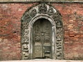 Ornate carvings on a doorway in Patan in Nepal