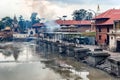 Cremation of a dead body at Bagmati River near Pashupatinath Hindu Temple in Kathmandu