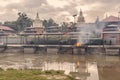 Cremation of a dead body at Bagmati River near Pashupatinath Hindu Temple in Kathmandu