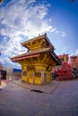 KATHMANDU, NEPAL OCTOBER 15, 2017: Beautiful golden building on the Bodhnath Stupa in Kathmandu, in a beautiful blue sky