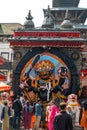 Kathmandu, Nepal - October 2019: Prayers near the statue of Kal Bhairav in Durbar Square during the Dashain Festival