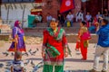 KATHMANDU, NEPAL OCTOBER 15, 2017: Unidentified nepalese woman wearing typical clothes posing for camera, in a Durbar